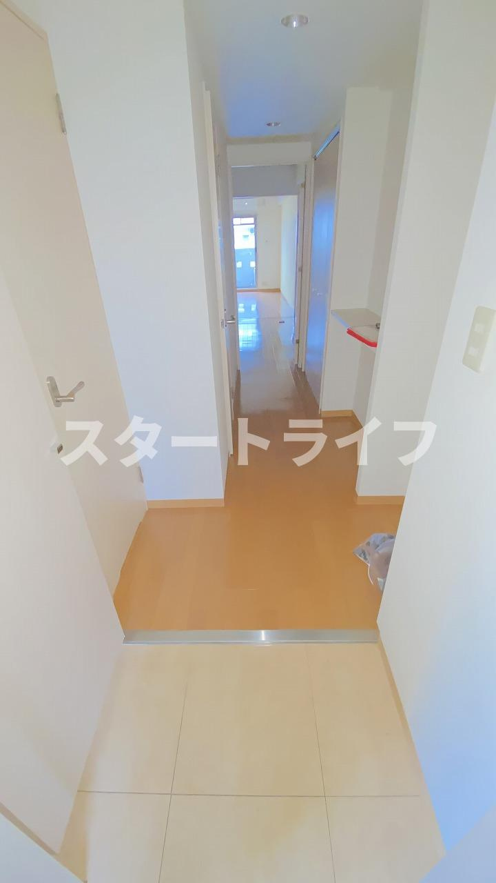 大阪市淀川区木川西４丁目の賃貸マンションの玄関