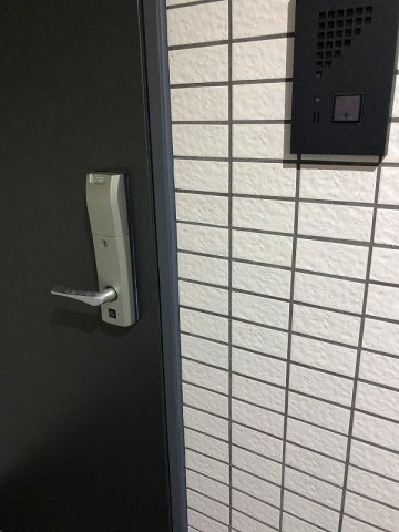 ステージグランデ生田駅前の玄関