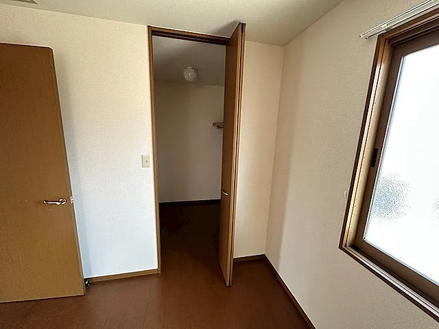 松山タウンハウスの寝室