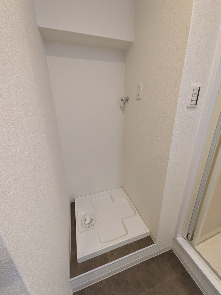 クローバーハイツ森小路三号棟のランドリースペース