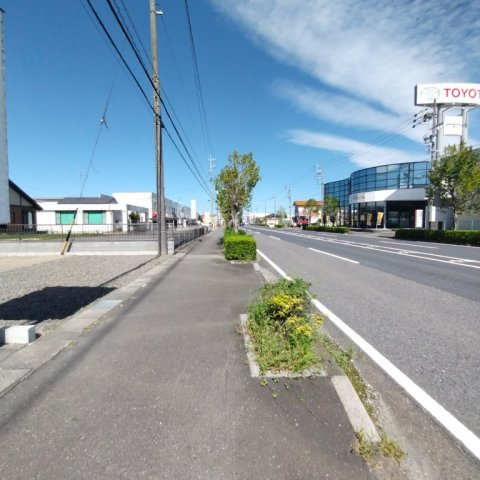 ６７４６９　羽島市竹鼻町飯柄分譲地の前面道路含む現地写真