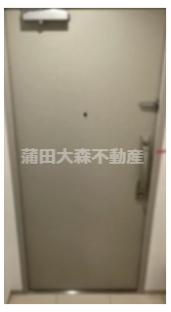 クレヴィアリグゼ蒲田西の玄関