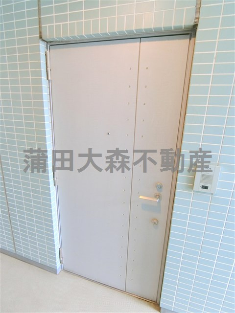 ウィステリア大森山王の玄関