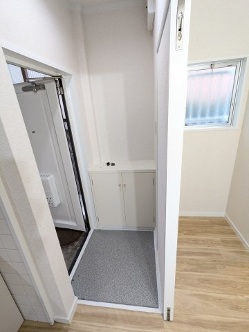 司マンションの玄関