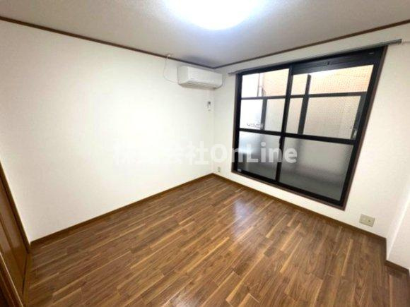 エス・ティマンション旭町の洋室