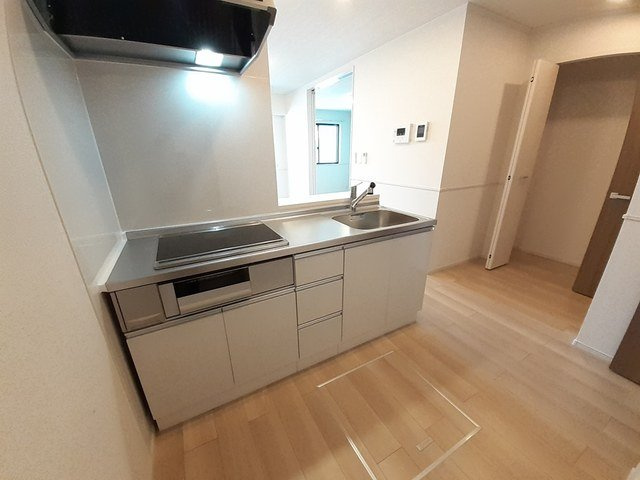 エクシード・ヴィラ津屋崎Ⅰのキッチン|コンパクトなキッチンで掃除もラクラク