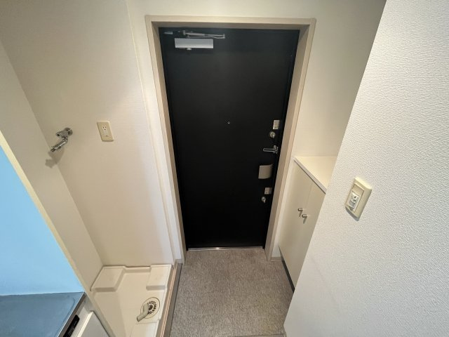 ライジングコート深江本町フラワーパークの玄関