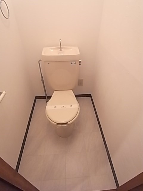 尼崎市塚口本町１丁目の賃貸マンションのトイレ