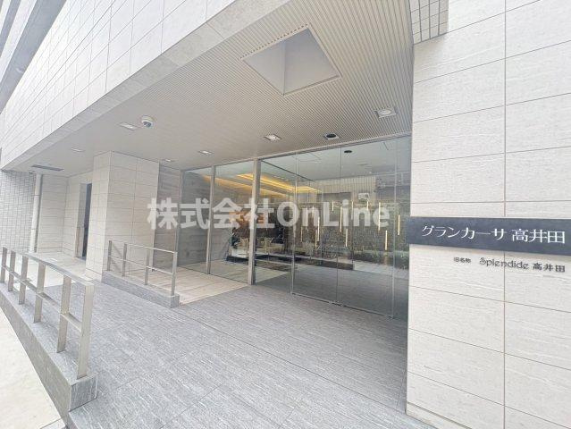 東大阪市高井田西６丁目の賃貸マンションのエントランス