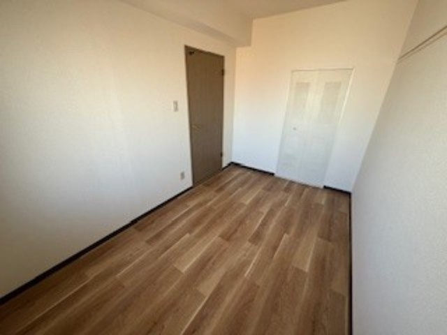 グランシャリオ誠治館の寝室