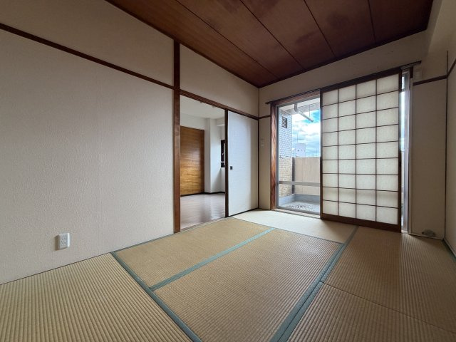 ハイツ粟新の寝室