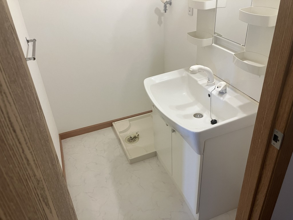 明石市大久保町西島のアパートの洗面所