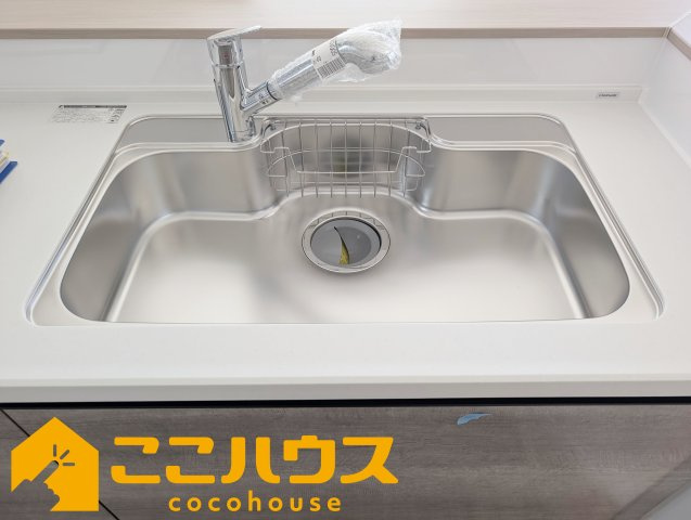 宜野湾市伊佐２丁目　ハートフルタウン　新築戸建て　全６棟　C号棟のキッチン|洗い物のしやすいワイドシンク