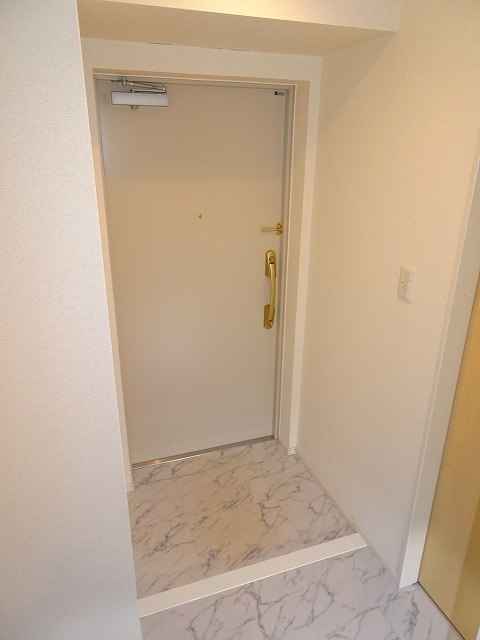 メゾンTMDの玄関