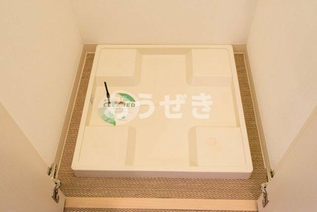 プレスタイル入谷Ⅱの玄関|室内洗濯機置場
