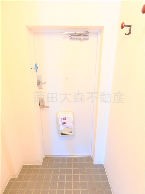 ソレイユ西六郷の玄関