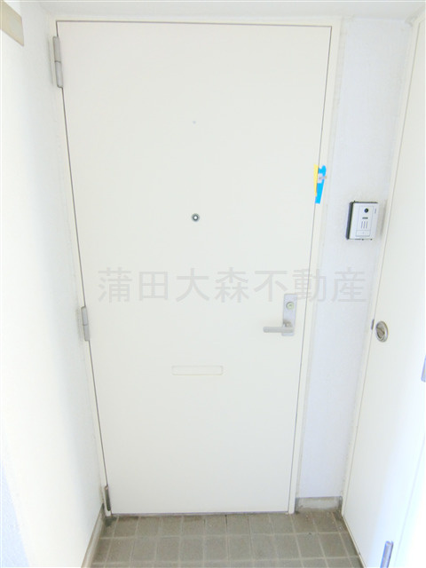 ソレイユ西六郷の玄関