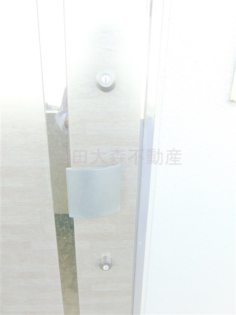 アジールコート武蔵新田の玄関
