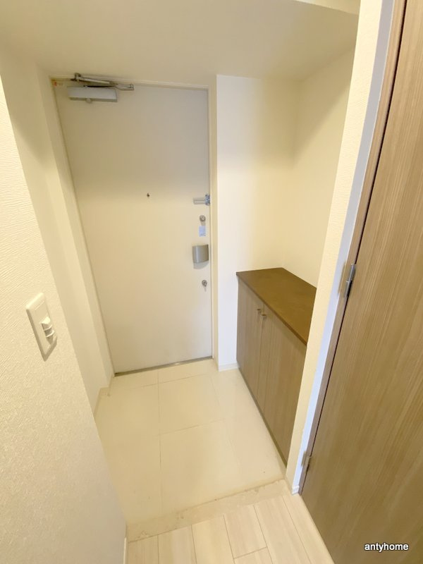 エスキュート梅田中崎町　仲介手数料無料の玄関