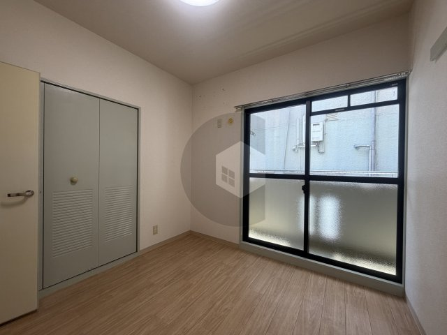 ジュネス高井田の寝室