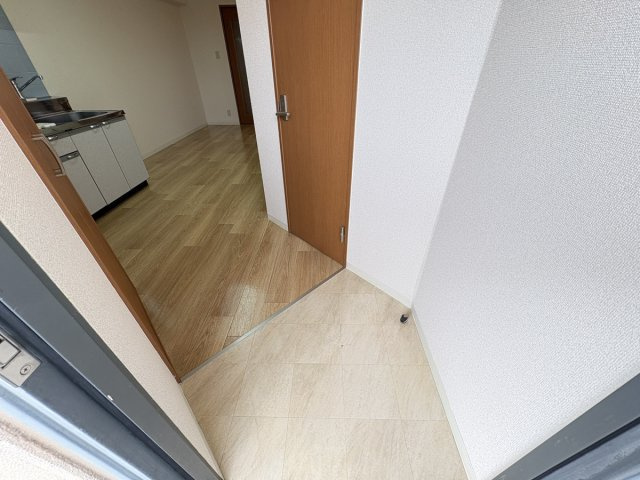 マンションニューヨーク医大東の玄関