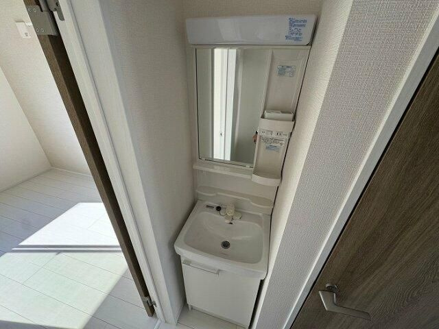 クレストコート上永谷の洗面所