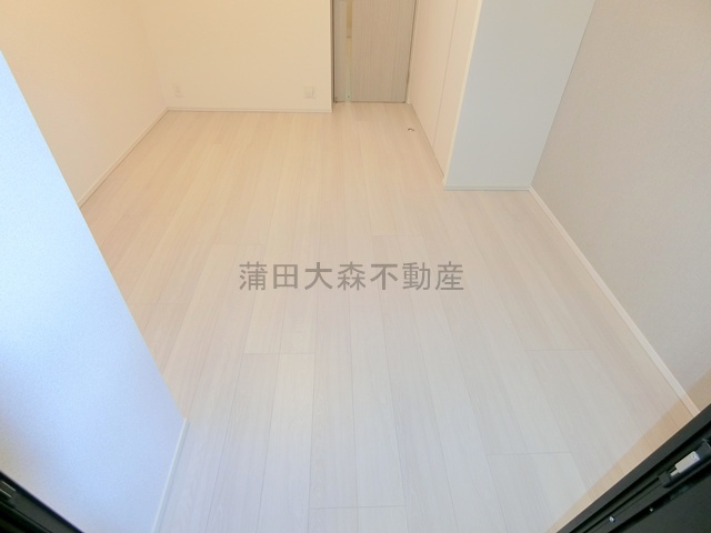 アークマーク大森町アジールコートの居間・リビング