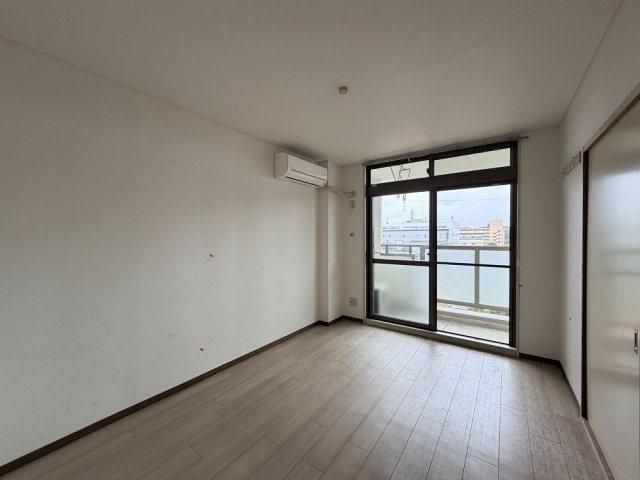 マンションつつみ起の洋室