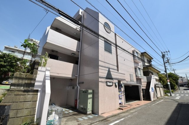 多摩市馬引沢２丁目の賃貸マンションの外観