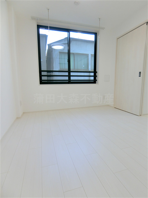 COCOCUBE大森本町の洋室