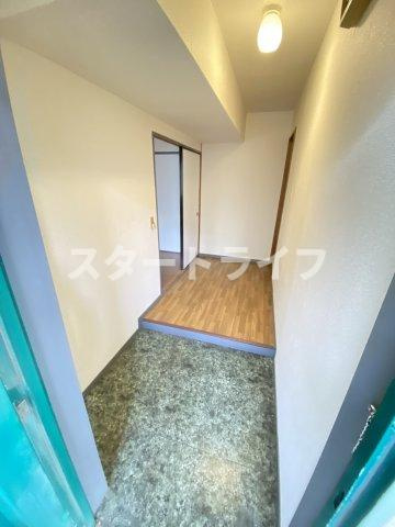大阪市東淀川区豊里５丁目の賃貸マンションの玄関