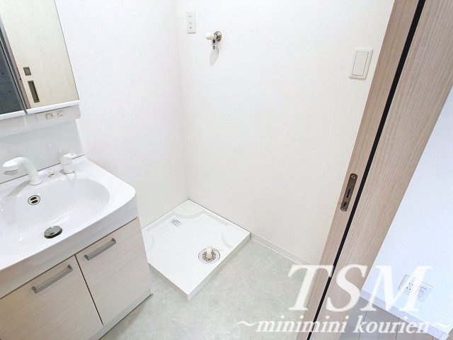 グラン寝屋川の洗面所|洗濯機置場