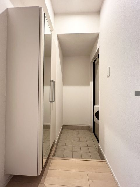 カームシティーＩＴ（イット）の玄関