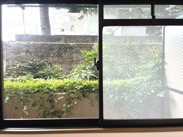 神戸市東灘区西岡本３丁目の賃貸マンションの庭