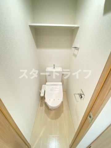 大阪市淀川区木川西１丁目の賃貸マンションのトイレ