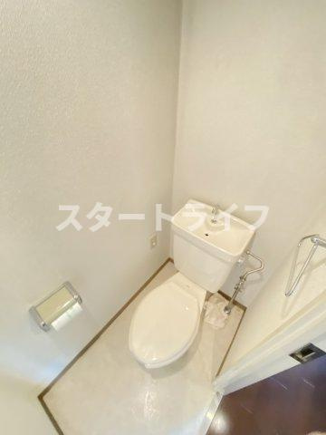 大阪市淀川区西三国１丁目の賃貸マンションのトイレ