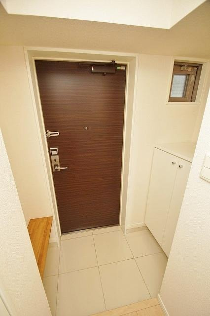 福岡市博多区千代２丁目のアパートの玄関|物件の画像6