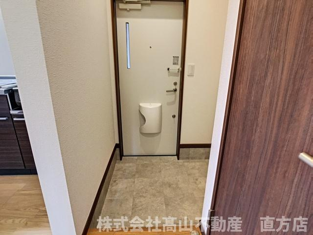 直方市大字頓野のアパートの玄関