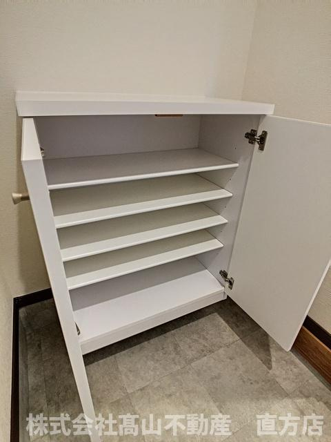 直方市大字頓野のアパートの玄関