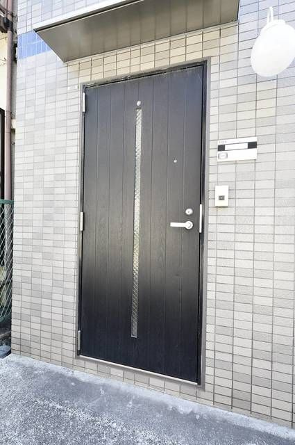 ソレイユハルミの玄関