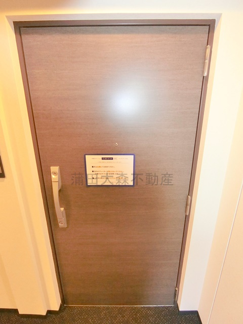クレヴィアリグゼ蒲田西の玄関