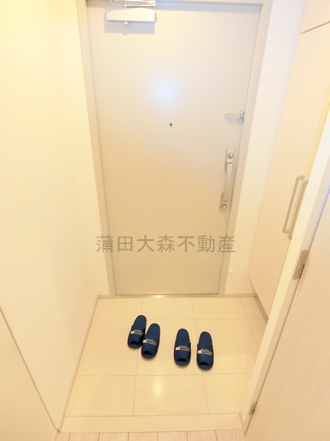 クレヴィアリグゼ蒲田西の玄関