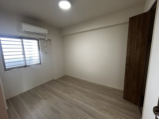 プレサンスロジェ我如古ヴォールタワーの洋室
