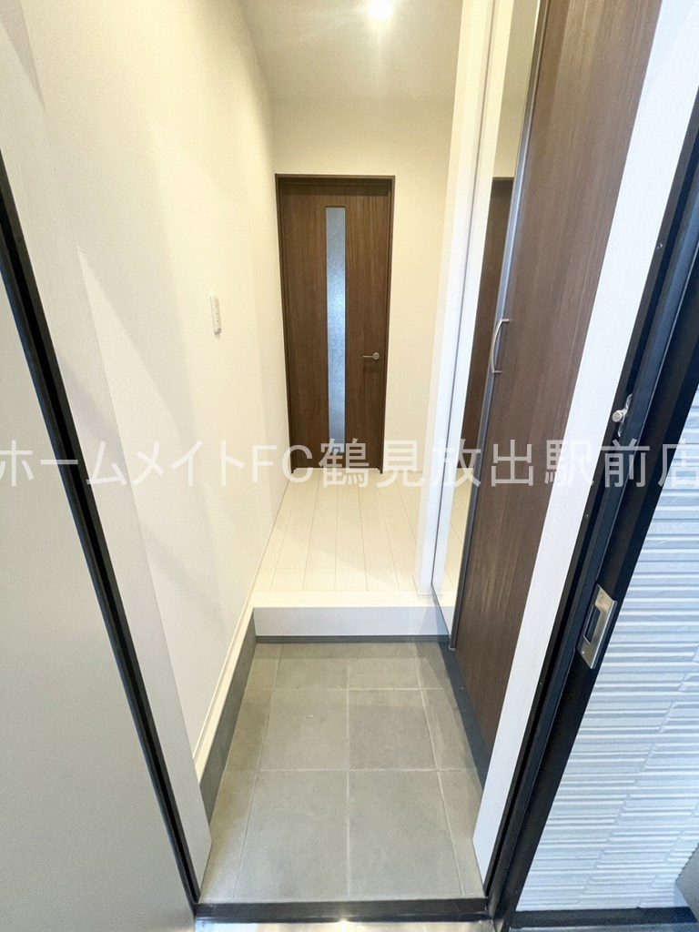 大阪市城東区諏訪１丁目のアパートの玄関