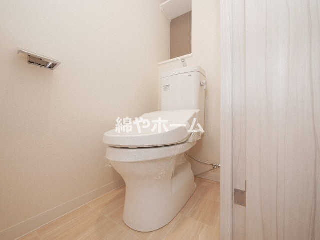 プレサンス上町台クレストのトイレ|落ち着いた色調のトイレです