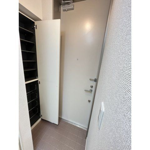プレジオ南大塚の玄関