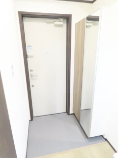 ケンオウヴィラ前原の玄関