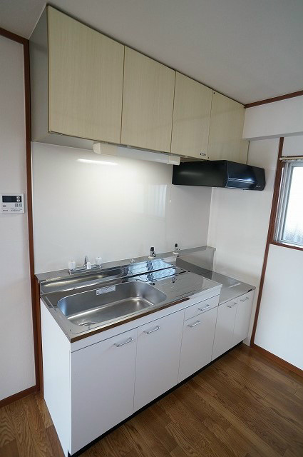 アクエルド長岡京のキッチン|システムキッチン採用。快適な調理スペースを確保した空間