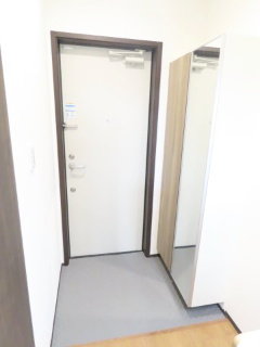 ケンオウヴィラ前原の玄関