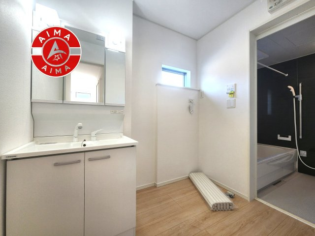 糟屋郡宇美町字平和2丁目第5-2棟（2号棟）の内観：施工例|脱衣所、洗面所は小さなプライベートスペース。歯磨き、洗顔と毎日施す個人空間。